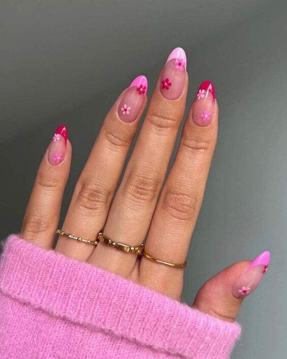 Vibrant Pink Floral Gradient Nail Design for a Fresh, Playful Aesthetic.