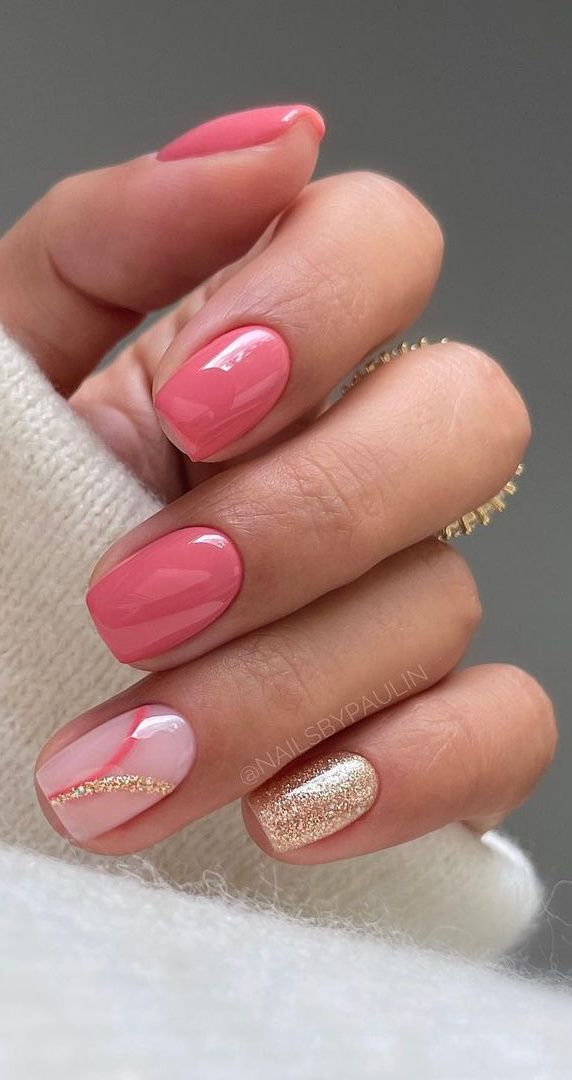 Elegant Colorful Nail Design with Soft Pink Shades and Sparkling Geometric Accents.