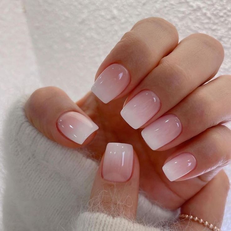 Chic Ombre Nails: Deep Pink to Translucent White for Sophisticated Style.