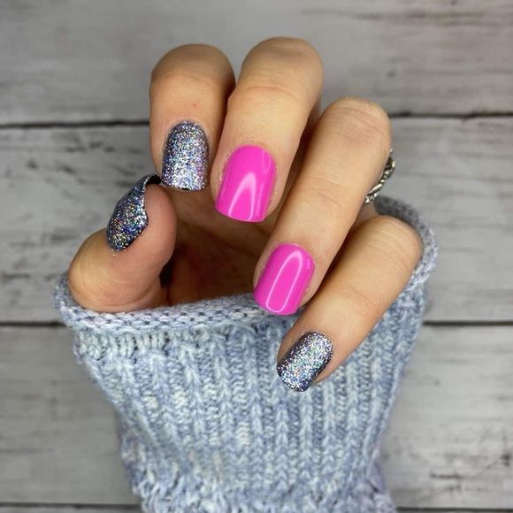 Bold Pink Nails with Glitter Accents for a Fun, Eye-Catching Manicure.