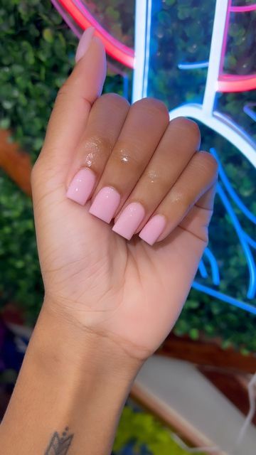 Elegant Soft Pink Manicure with Square-Shaped Nails for a Modern Look.