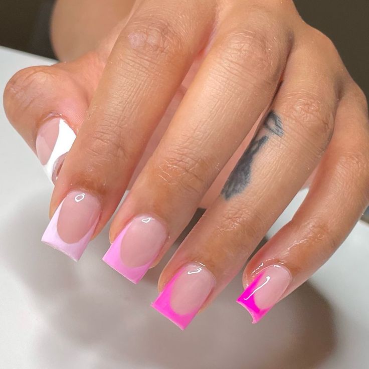 Chic Ombre Nail Design: Soft Pink with Vibrant Neon Tips for a Modern Elegance.