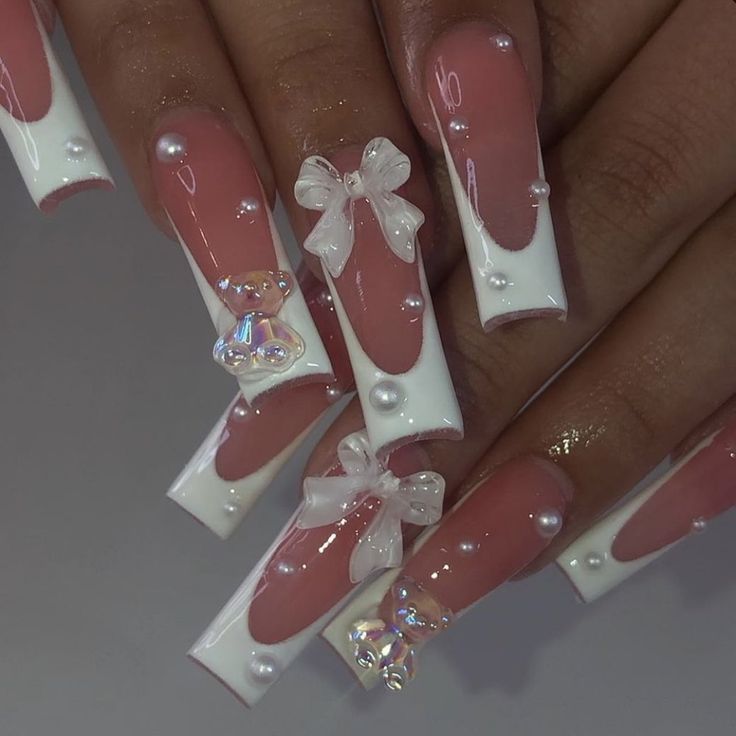 Elegant Chic Nail Design with Soft Pink, Glossy White, and Pearl Accents.