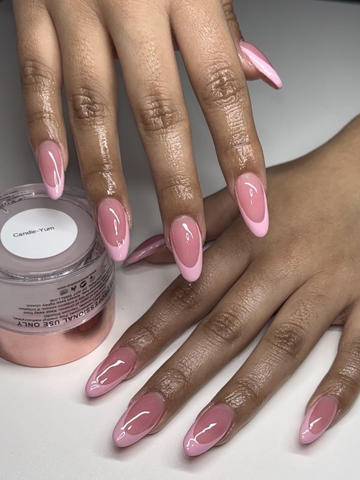 Chic Almond-Shaped Nail Art with Soft Pink Hues and Classic French Tips