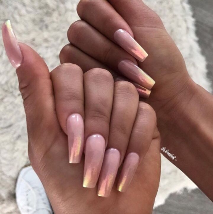 Elegant Ombre Stiletto Nails: Soft Pink to Shimmering Pastel Gradient.