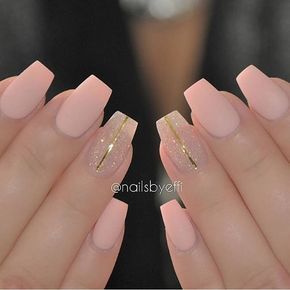 Chic Pastel Pink Nail Design with Glittery Accents and Gold Stripes