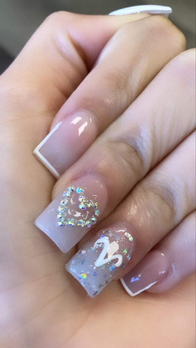 Elegant Nail Design with Glitter Accents and Chic Details for Any Occasion