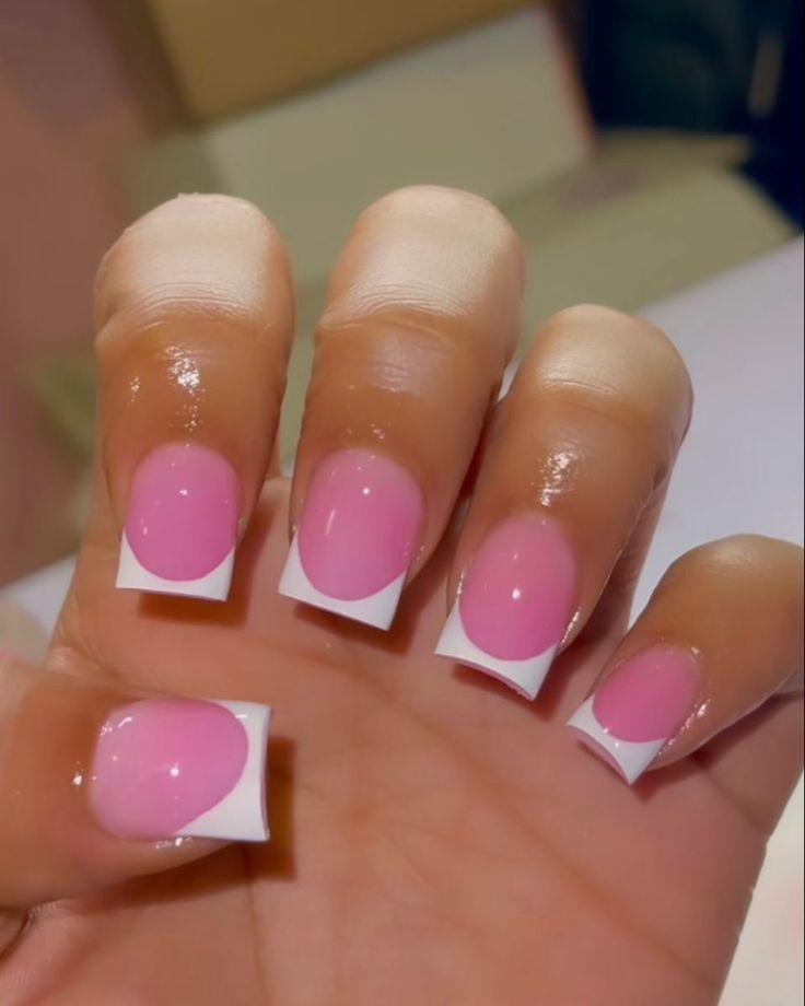 Chic and Modern Soft Pink and White Nail Design with Frosted Tips.