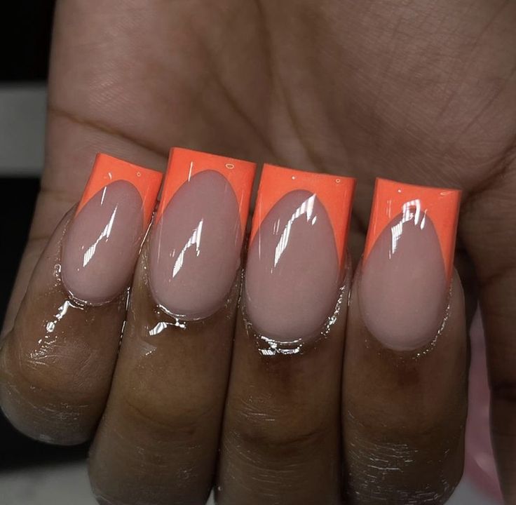 Vibrant Bold Orange Tip Nails on Nude Base: A Perfect Blend of Playful Elegance.