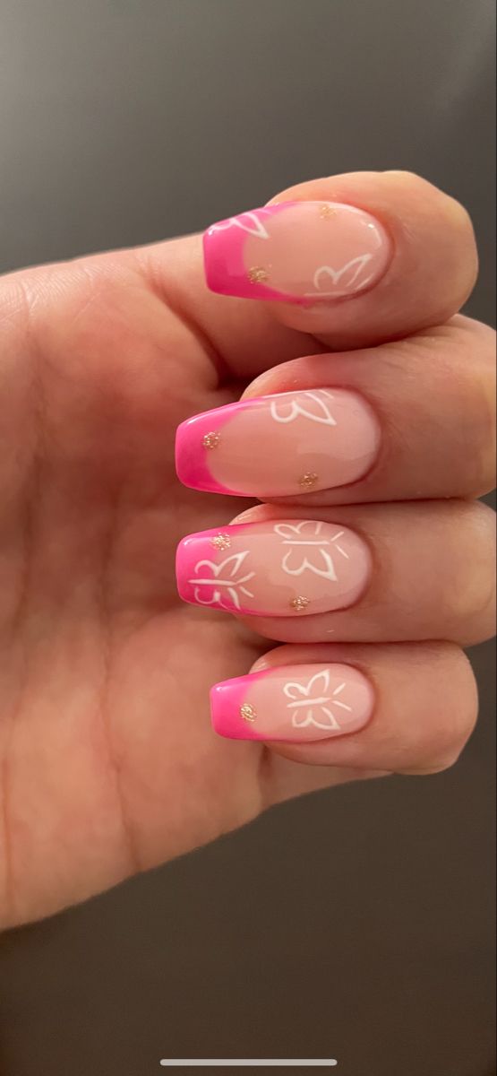 Elegant Gradient Pink Nail Design with Whimsical Butterflies and Glamorous Gold Accents