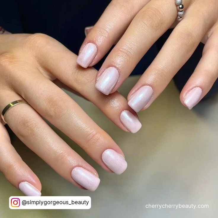 Sophisticated Square Nail Design in Soft Iridescent Pink.