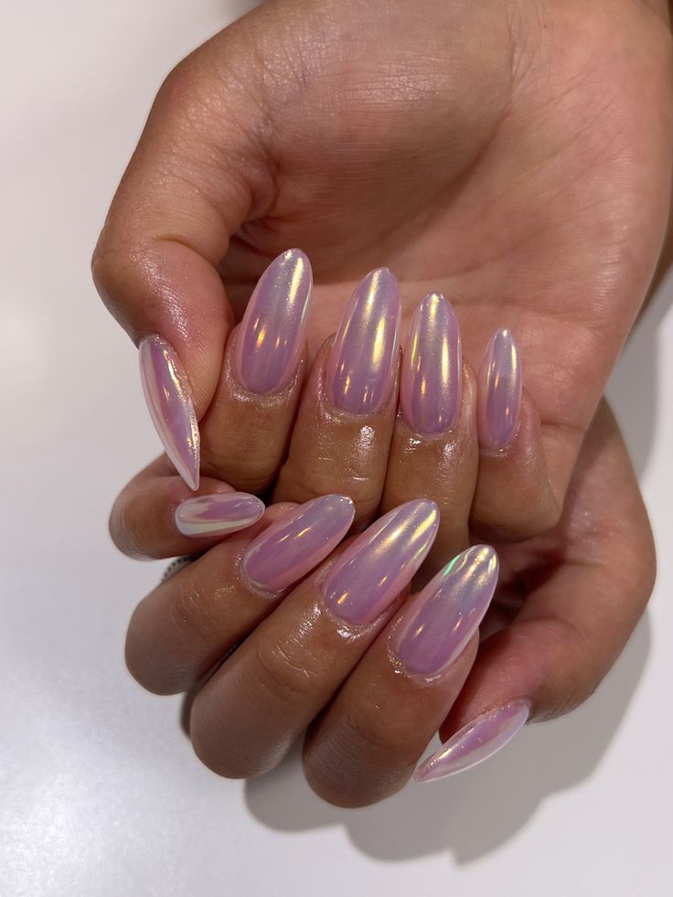 Elegant Iridescent Nails: A Whimsical Blend of Soft Pink and Pearlescent Hues.