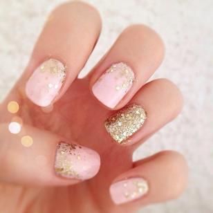 Chic Soft Pink and Gold Glitter Nail Design for Special Occasions