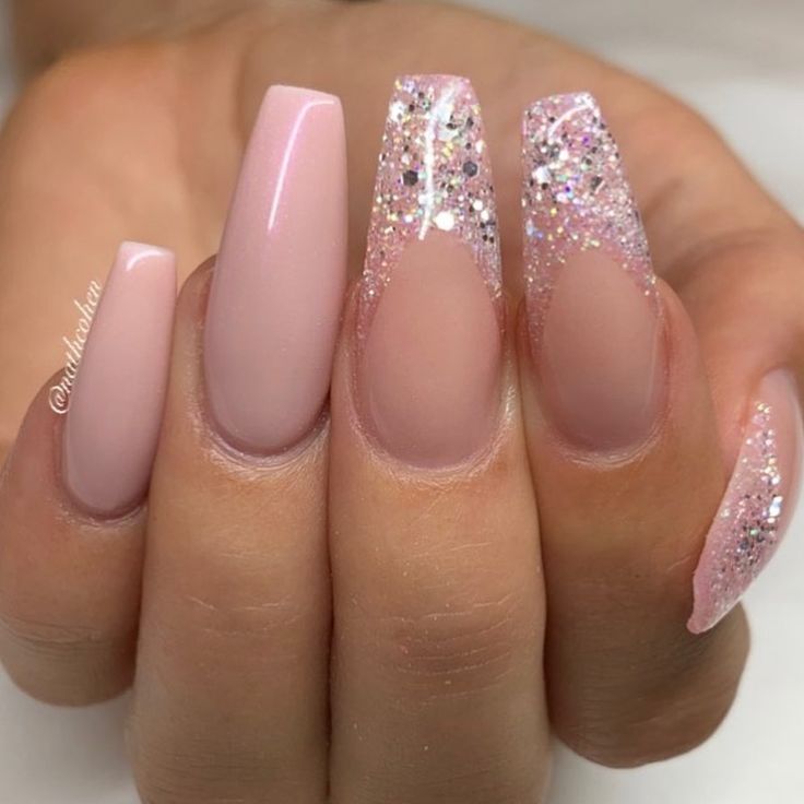 Elegant Chic Nail Design: Soft Pink Base with Glitter Accents and Textured Contrast.