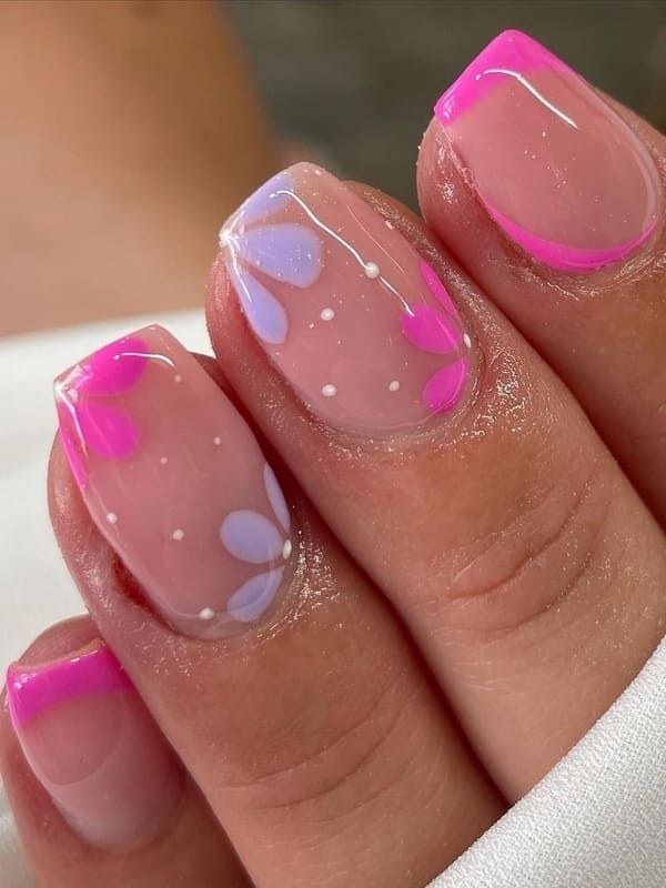 Cheerful Floral Nail Design with Colorful Petals on a Clear Base