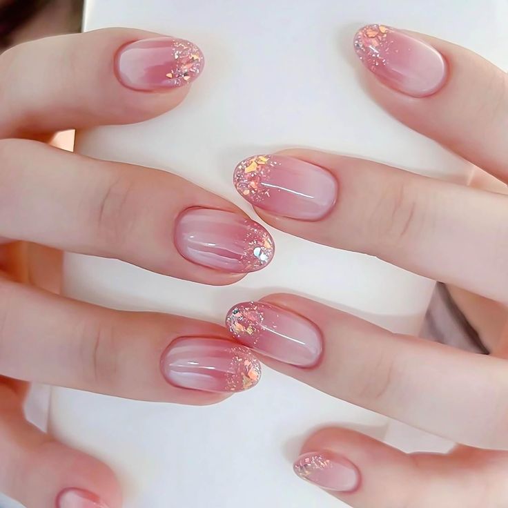 Elegant Gradient Nail Design with Glitter Tips for a Fresh Look