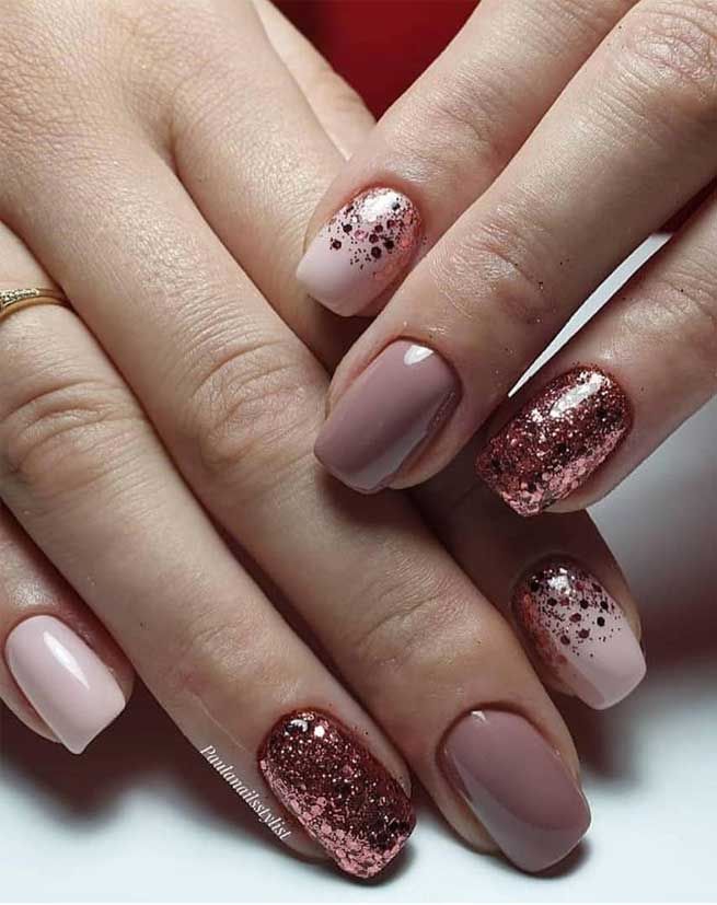 Chic and Versatile Nail Design: Soft Pink and Nude with Rose Gold Glitter Accents.