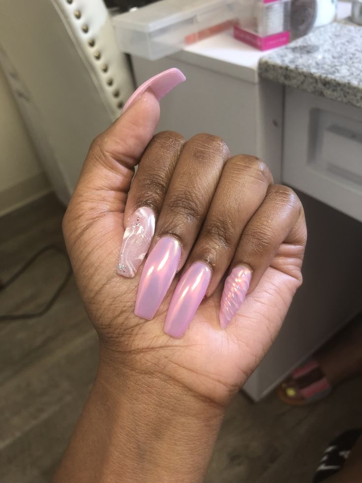 Elegant Long Pink Nails with Glossy and Matte Finishes, Featuring a Unique Marbled Accent.