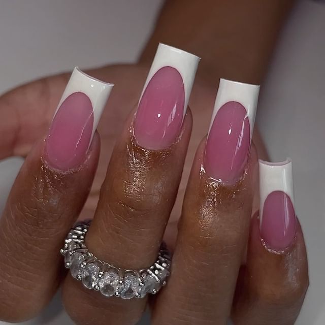 Sophisticated Soft Pink and White Geometric Nail Design with Sparkling Ring Accents