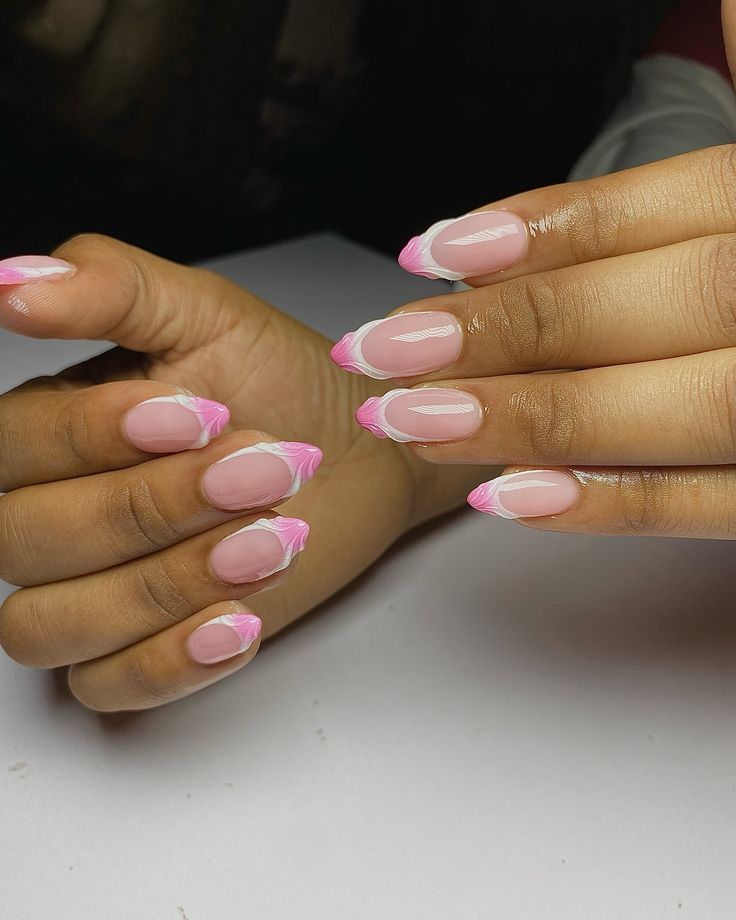 Chic Soft Pink Nail Design with Delicate White and Pink Tips for a Modern Aesthetic.