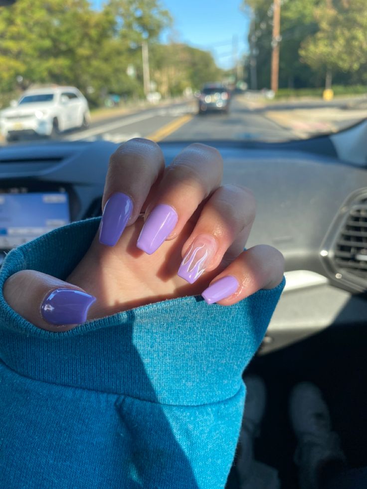 Glossy Lavender Nail Design: A Playful and Sophisticated Autumn Manicure.