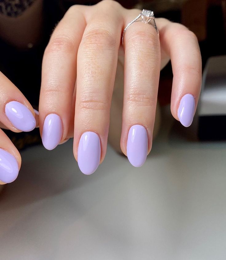 Elegant Lavender Oval Nails: A Versatile Manicure for Any Occasion.