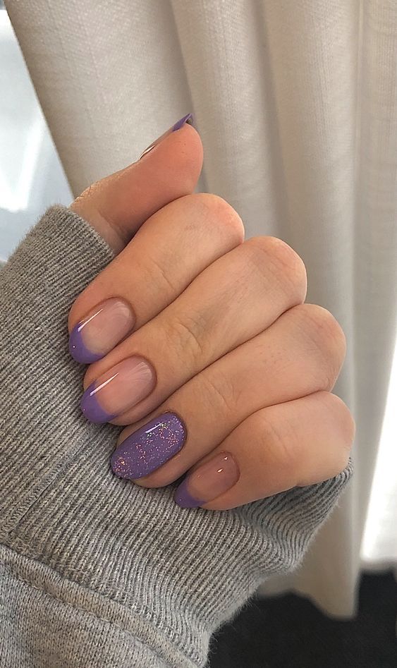 Chic Pastel Purple Nail Design with Ombre Tips and Glitter Accents