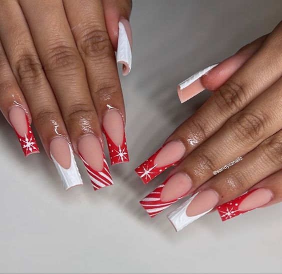 Festive Holiday Nail Design: Chic Red and White with Snowflakes and Candy Cane Stripes