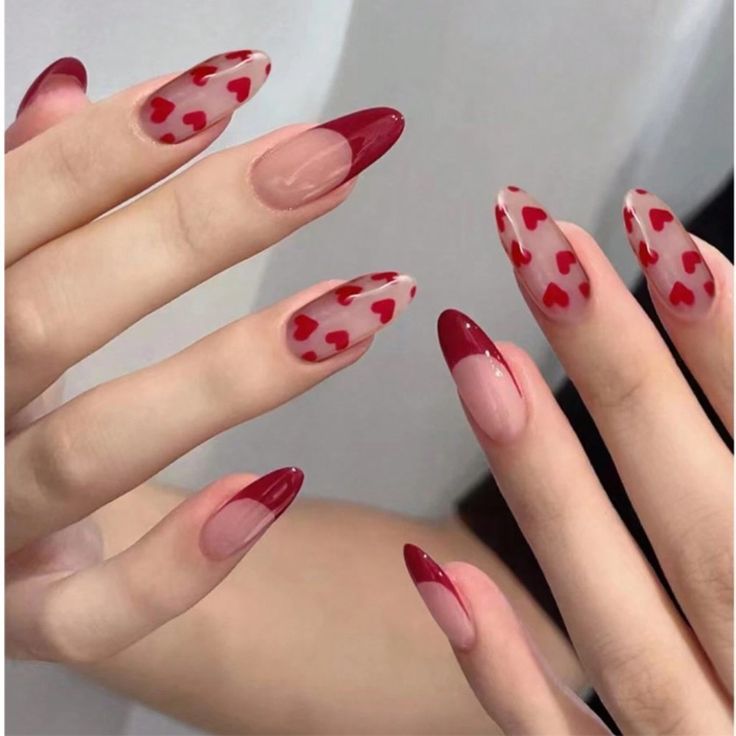 Romantic Heart-Themed Almond Nail Design with Red and Nude Hues