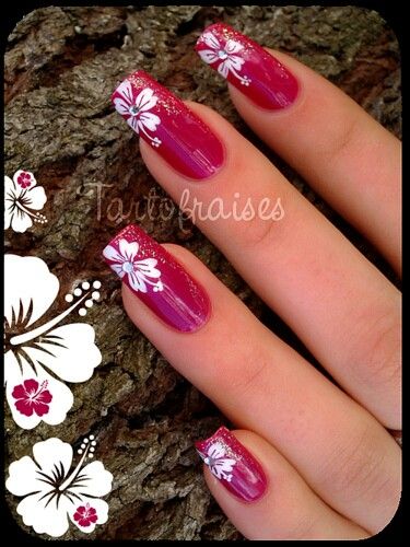 Chic Tropical Vibes: Burgundy Nails with Delicate White Floral Designs.