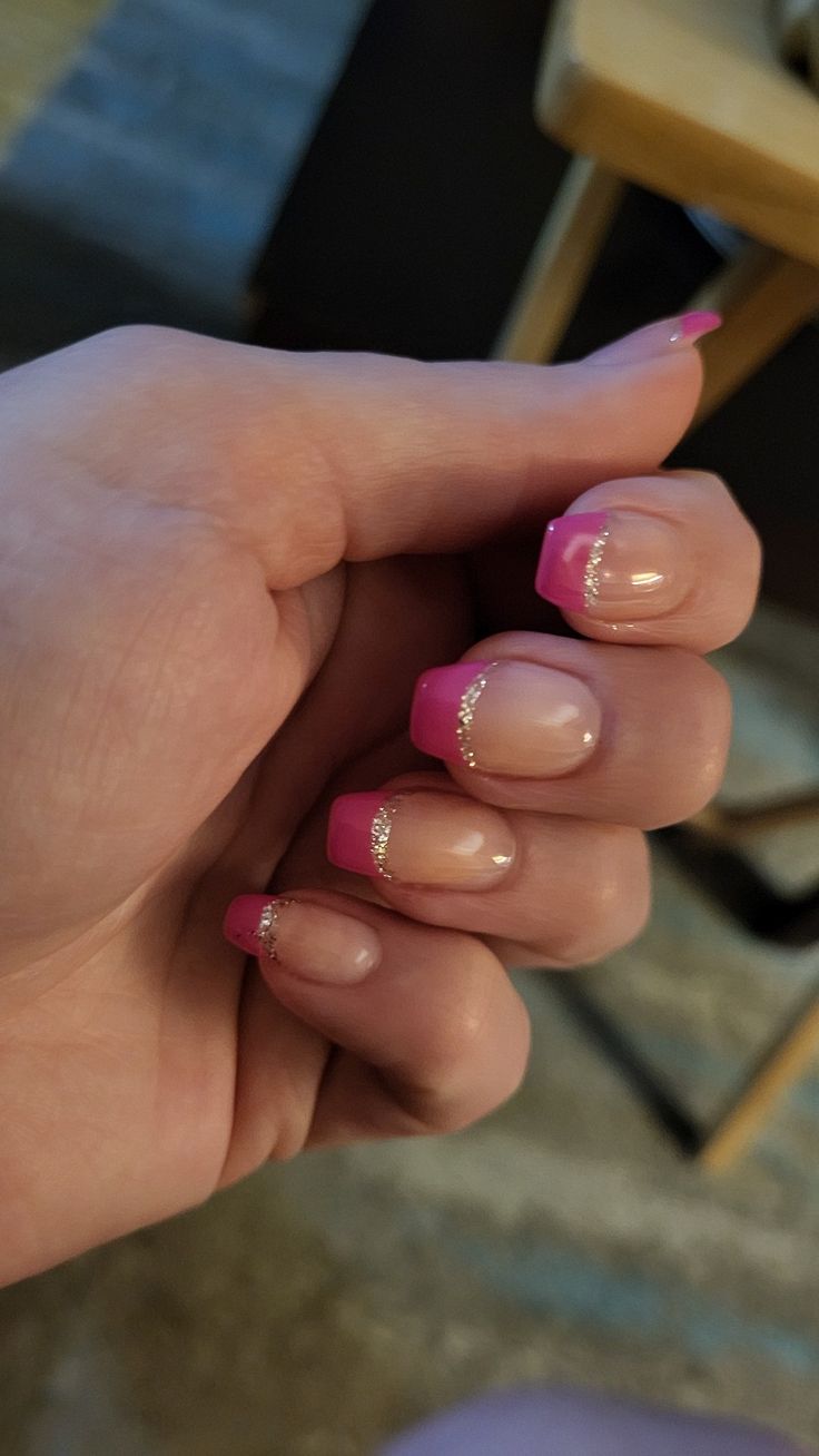 Elegant Pink French Tip Nails with Glitter: A Modern and Feminine Blend for Any Occasion.