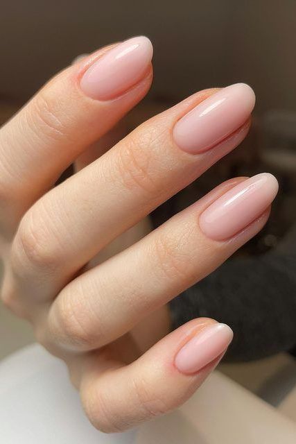 Sophisticated Blush Pink Almond-Shaped Nails: Versatile Elegance for Any Occasion