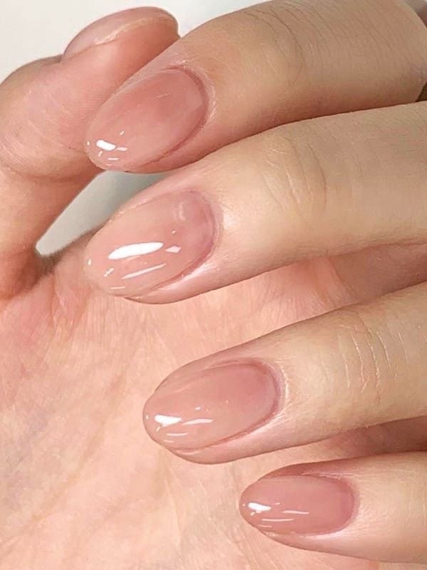 Sophisticated Elegant Nude Nail Design with Glossy Finish for Any Occasion