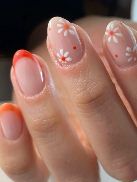 Charming Floral Nail Design with Dainty Daisies, Red Accents, and Pink Base