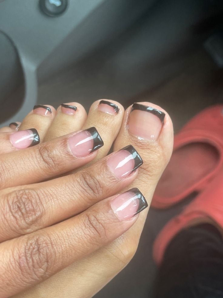 Chic French Tip Manicure with Black Tips on Nude Base