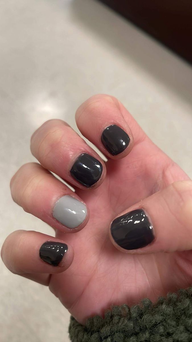 Chic Minimalistic Nail Design in Dark and Light Gray with Black Accents.