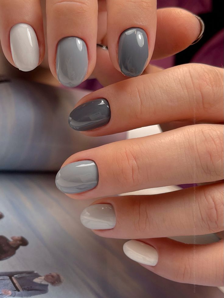 Chic Grey and White Nail Design: A Modern Blend of Glossy and Matte Finishes.