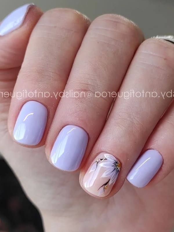 Elegant Lavender Nail Design with Floral Accent and Smooth Pastel Finish.