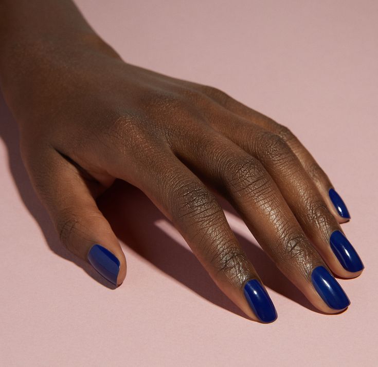 Bold and Chic: Vibrant Blue Nail Design with Glossy Finish