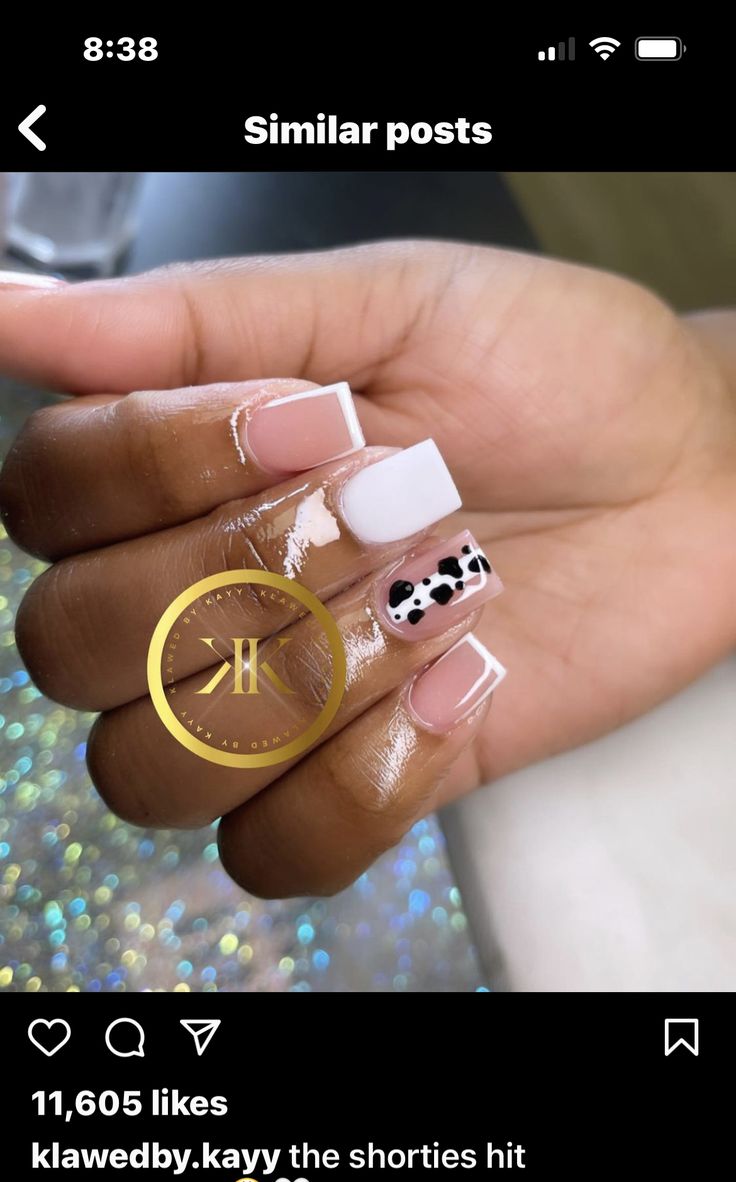 Trendy Chic Nail Design: Soft Pink and Crisp White with Playful Black and White Spots