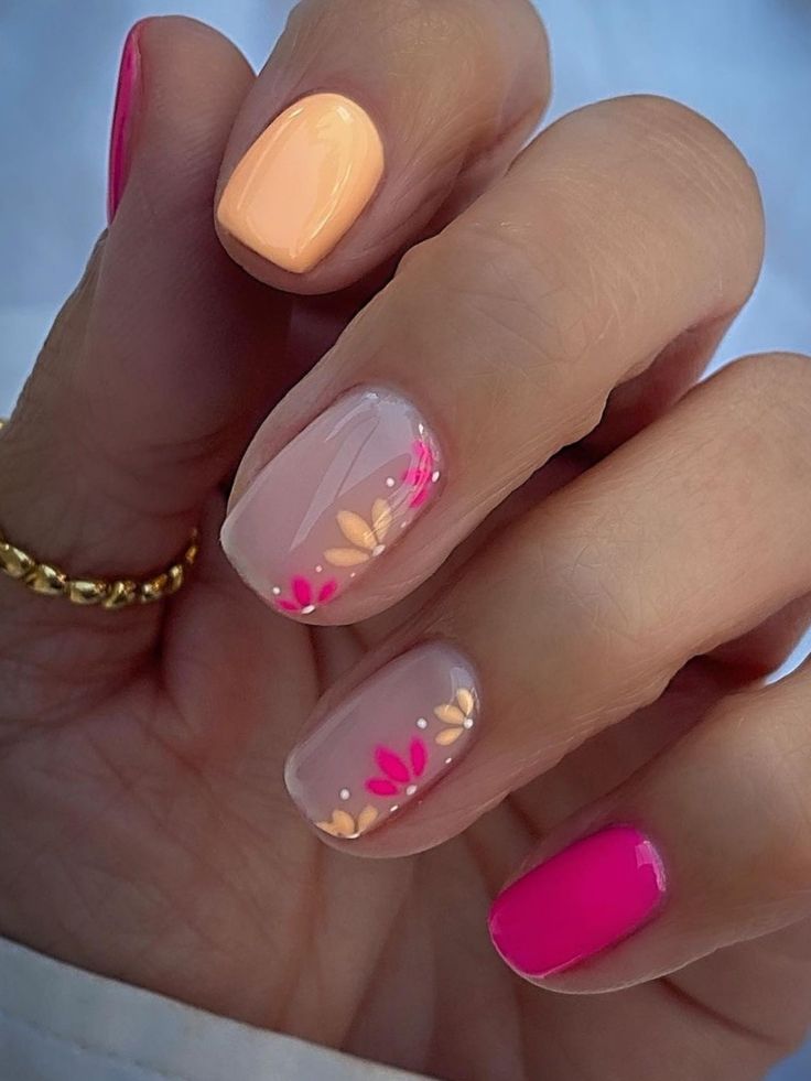 Cheerful Pastel and Vibrant Nail Design with Floral Elegance.