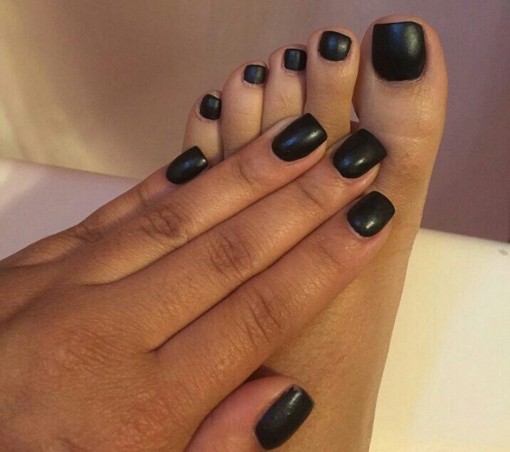 Chic Black Matte Manicure and Pedicure: A Bold, Minimalist Elegance.