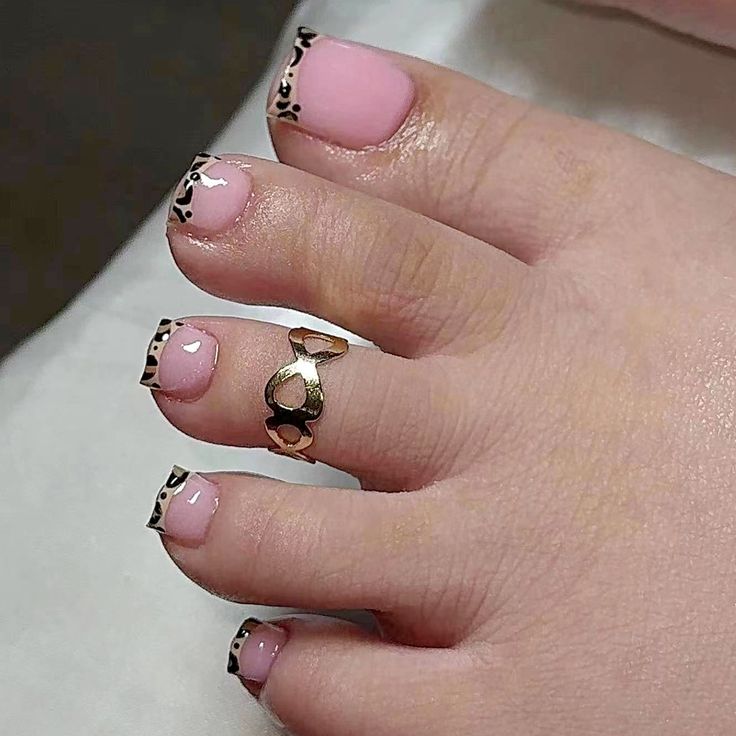 Chic Leopard Print Pedicure with Soft Pink Base and Delicate Toe Ring