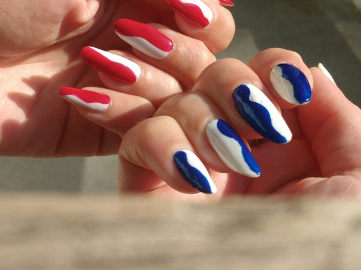 Patriotic Wavy Nail Design in Red, White, and Blue