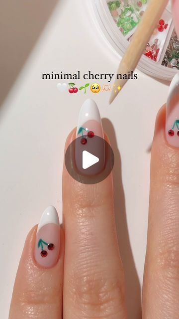 Charming Minimal Cherry Nails: Elegant White Base with Delicate Illustrations.