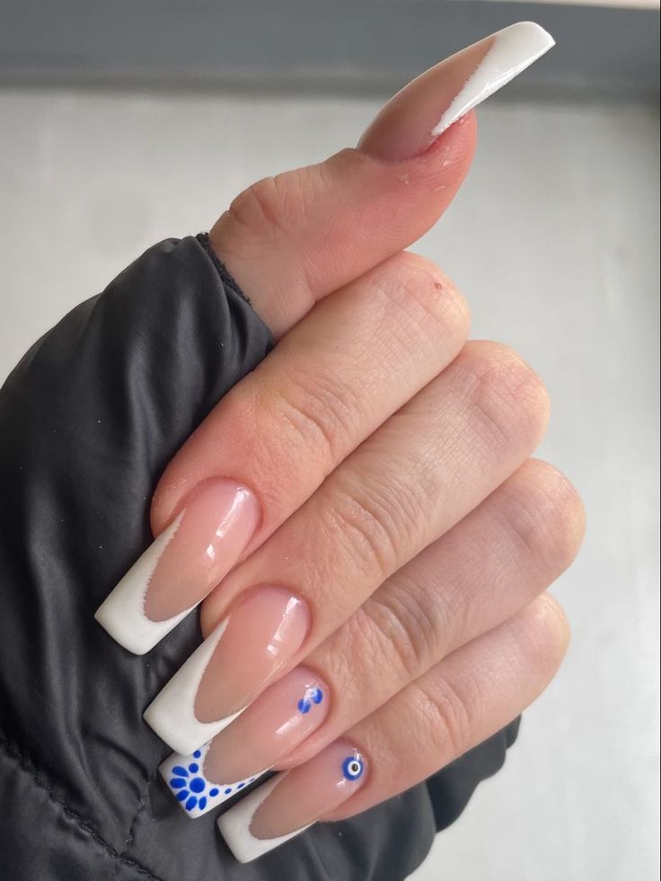 Chic French Manicure with Elegant Long Square Tips and Playful Blue Accents