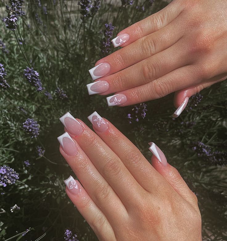 Chic Floral French Tips with Soft Pink Polish for a Romantic Spring Aesthetic