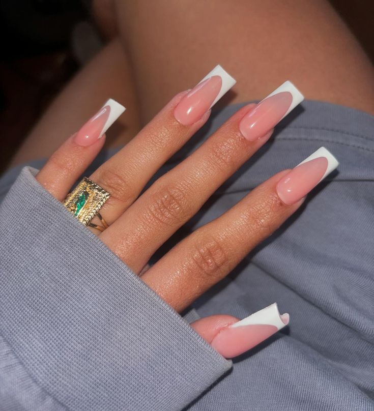 Elegant Pink and White Nail Design with Glossy Finish and Statement Ring.