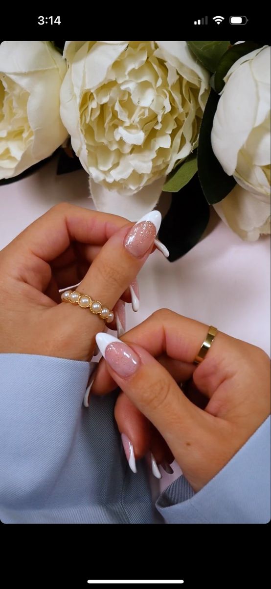 Sophisticated Nail Design: Soft Pink and Classic White with Sparkling Accents