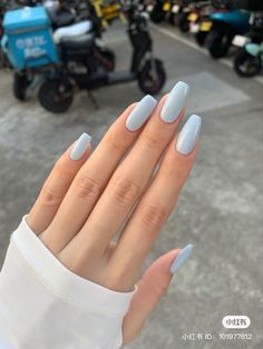 Elegant Baby Blue Long Nails: A Stylish and Polished Choice for Modern Nail Art.